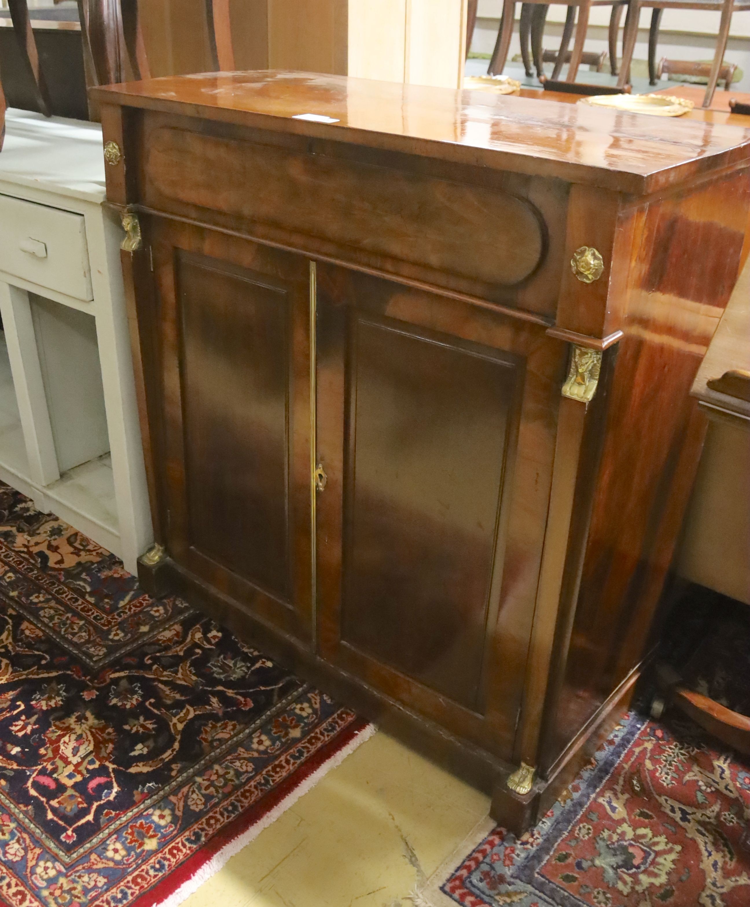 A late Regency mahogany brass mounted chiffonier, width 99cm, depth 46cm, height 102cm